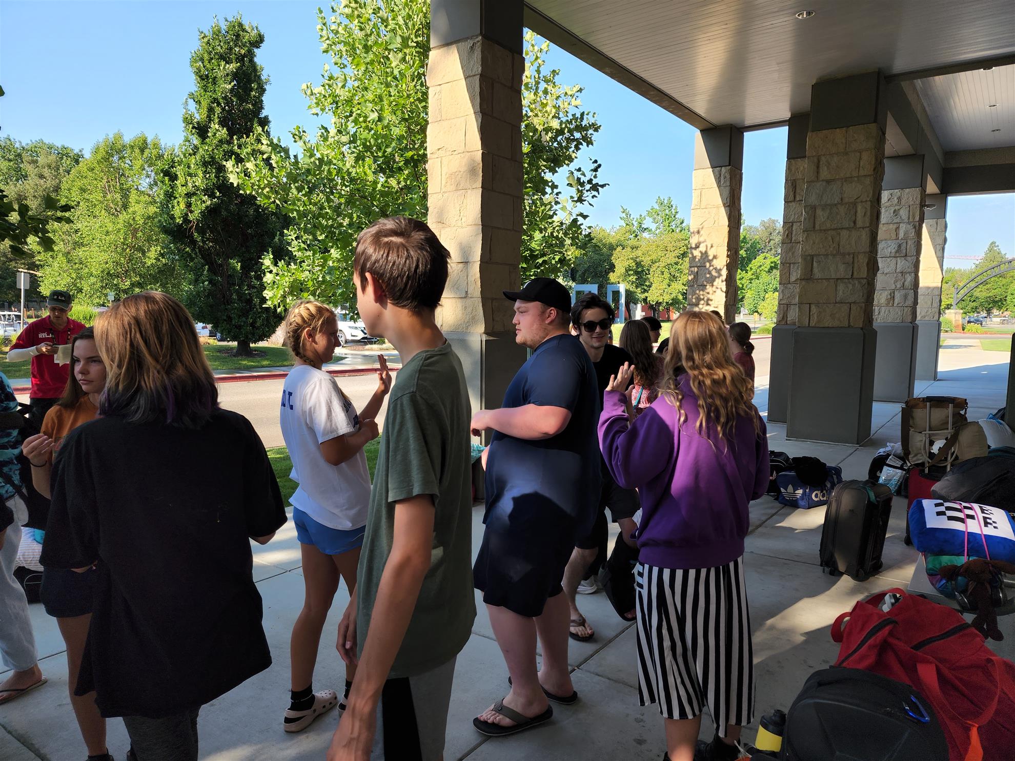 RYLA students waiting for the bus. Courtesy of Linda Gerber.