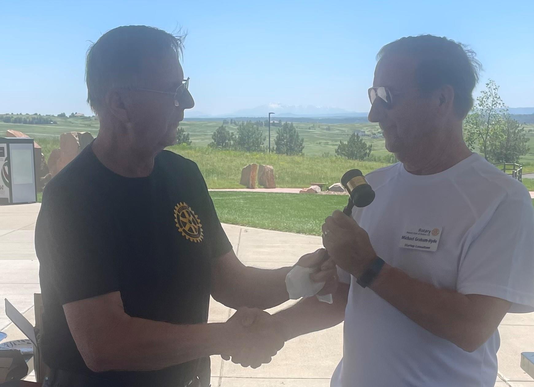 Passing the gavel change-of-command Rotary Club Parker Colorado