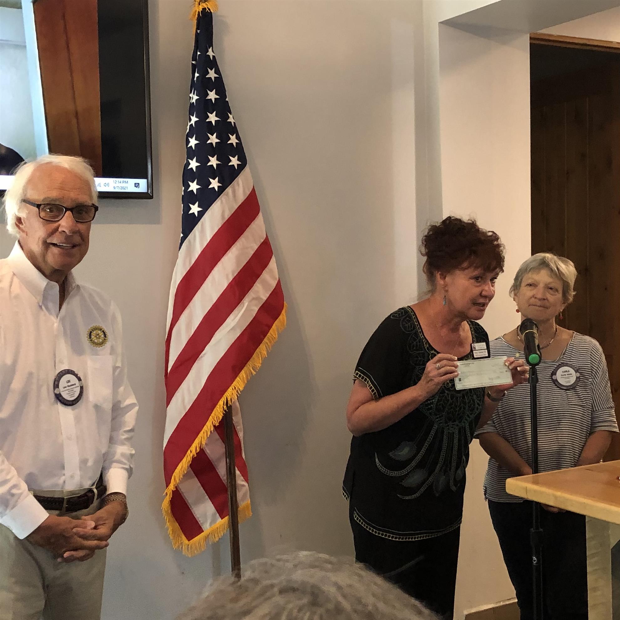 Puttin' in the Pines check presentation to Northland Hospice