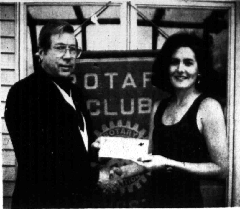 Joe Zahn accepts a Gift of Life check from Deborah Flattery of Livingston Mall, 1993