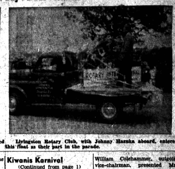 Livingston Rotary float with club sign and Johnny Hazuka aboard at the 1956 Memorial Day parade