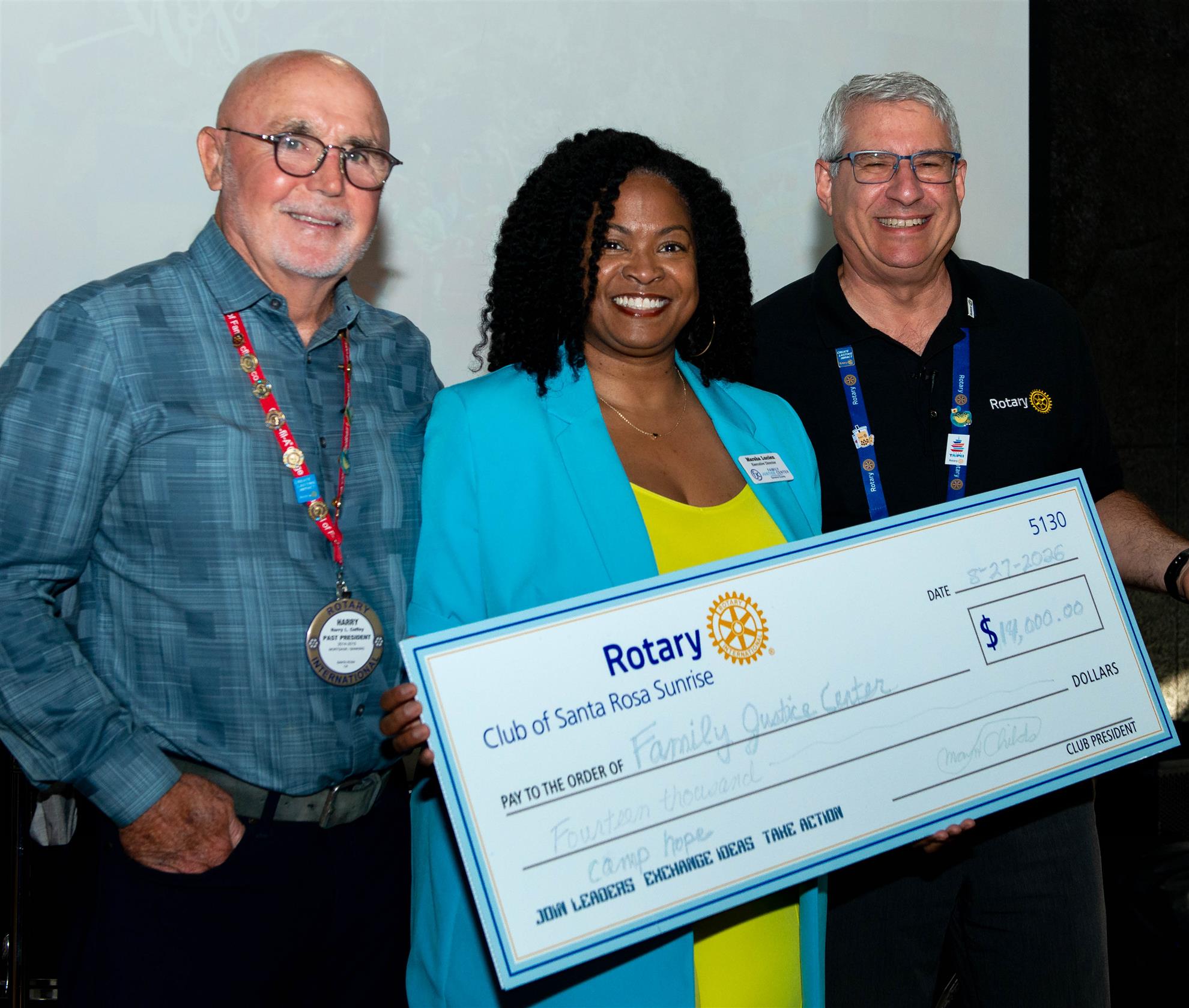 Harry Coffey, Camp Hope Representative Marsha Lucien and President Max