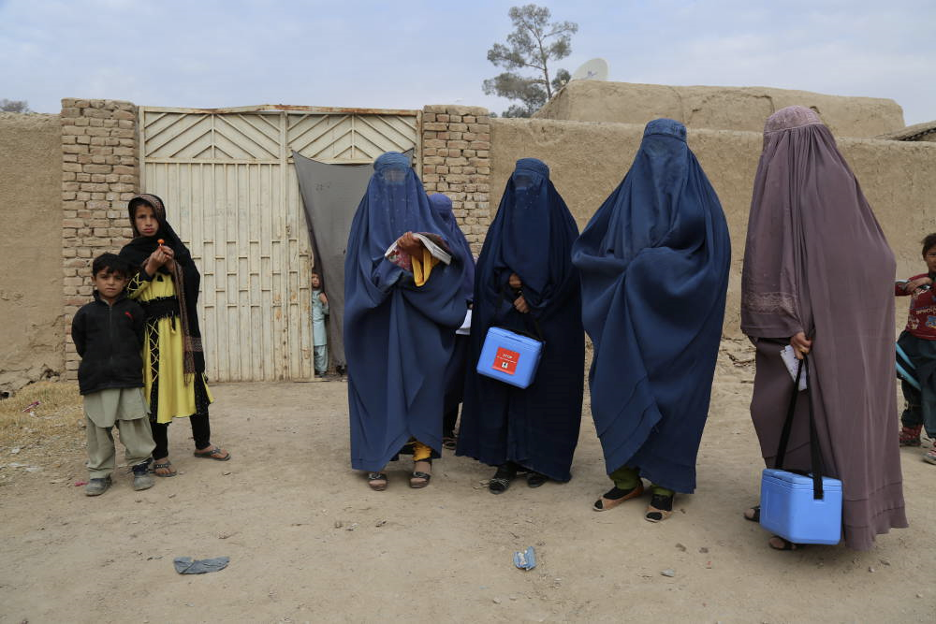 a Female Vaccination Team preparing to immunize children against Polio in Afghanistan.