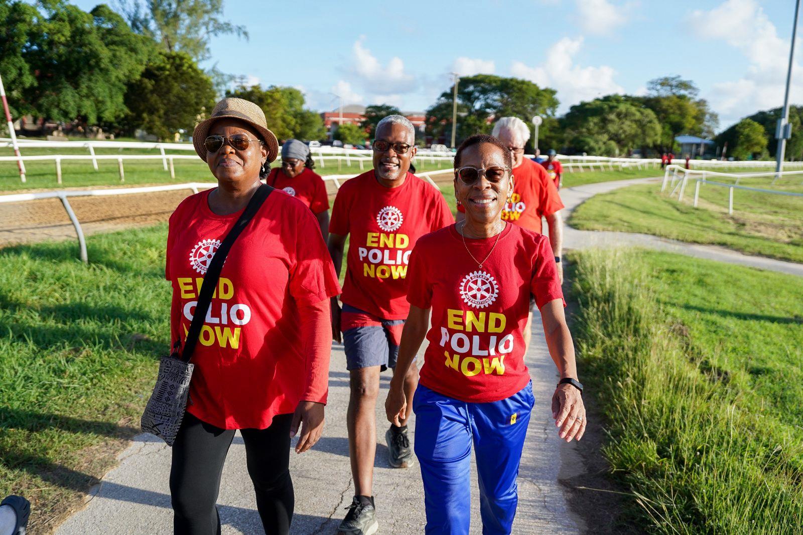 3 presidents walking together at the walk to end polio