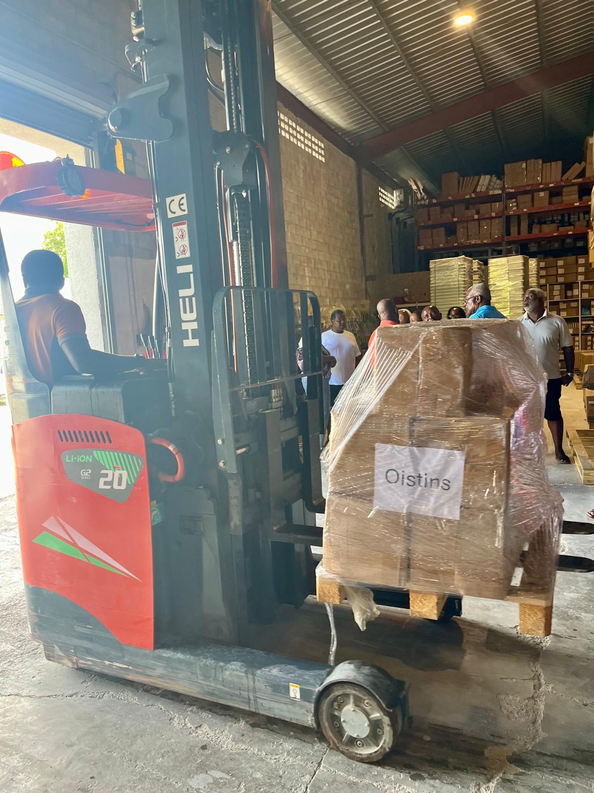 Fork lift with supplies for fisherfolk boat repairs