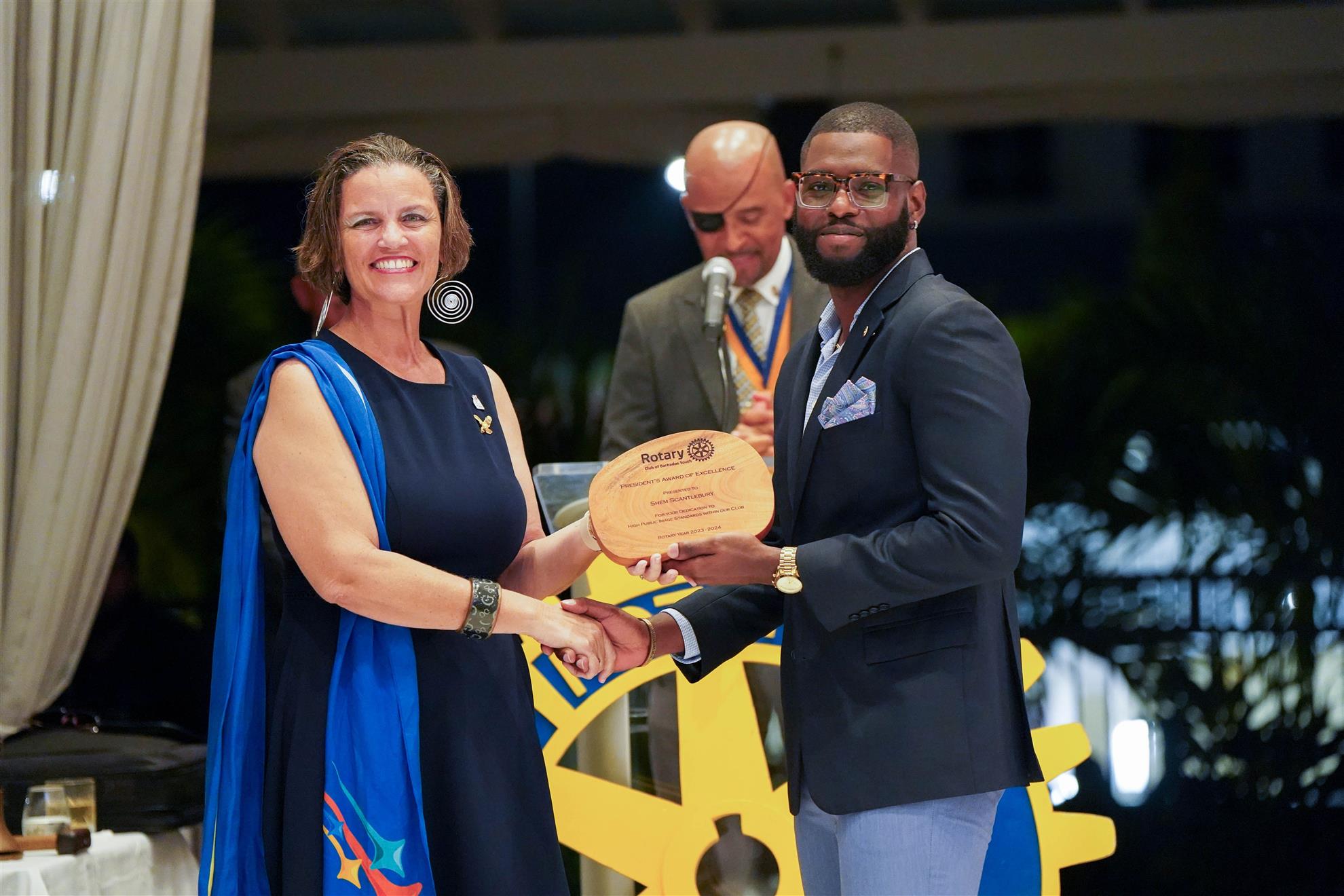 Director Shem receiving his award from PDG Sonya