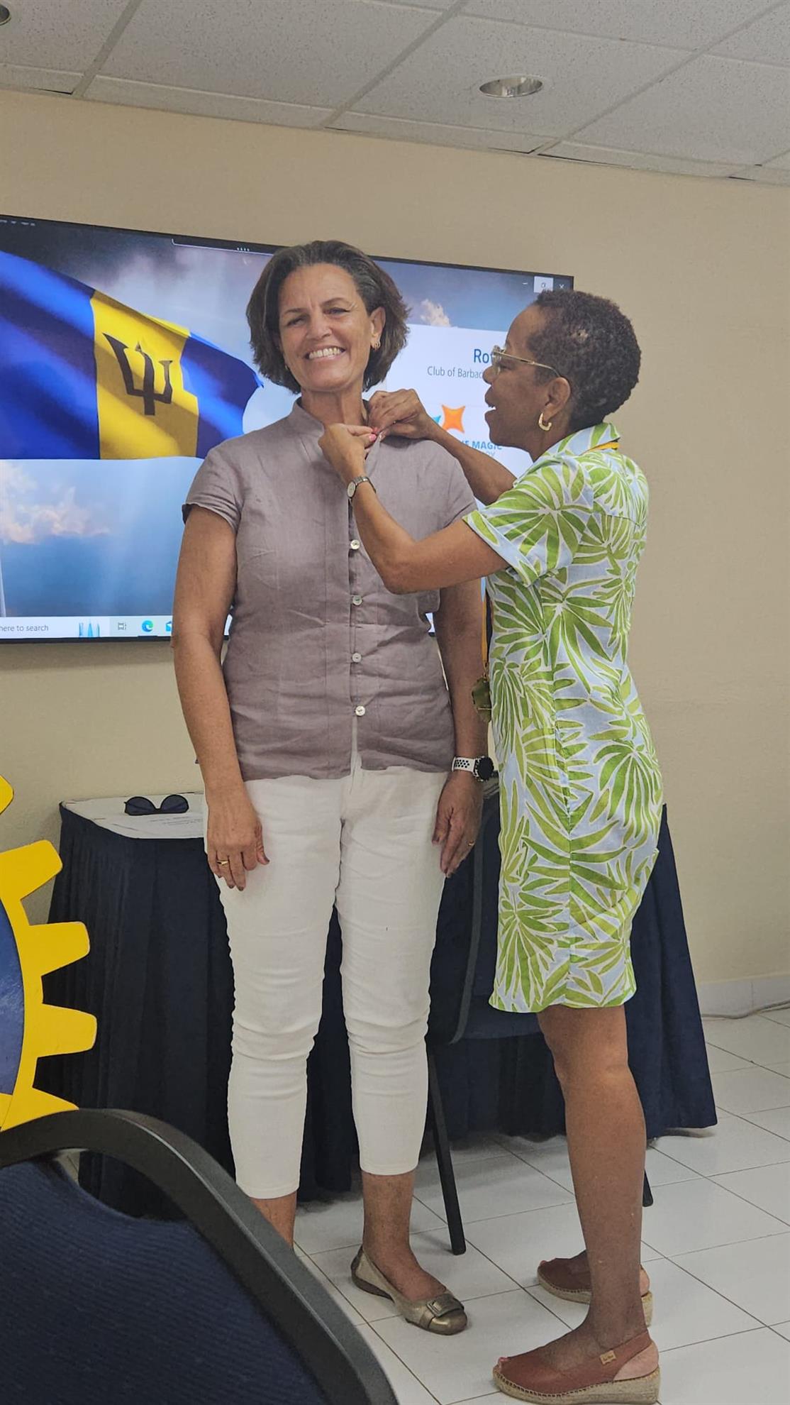 President Terry pinning PDG Sonya with her level 5 PHF pin