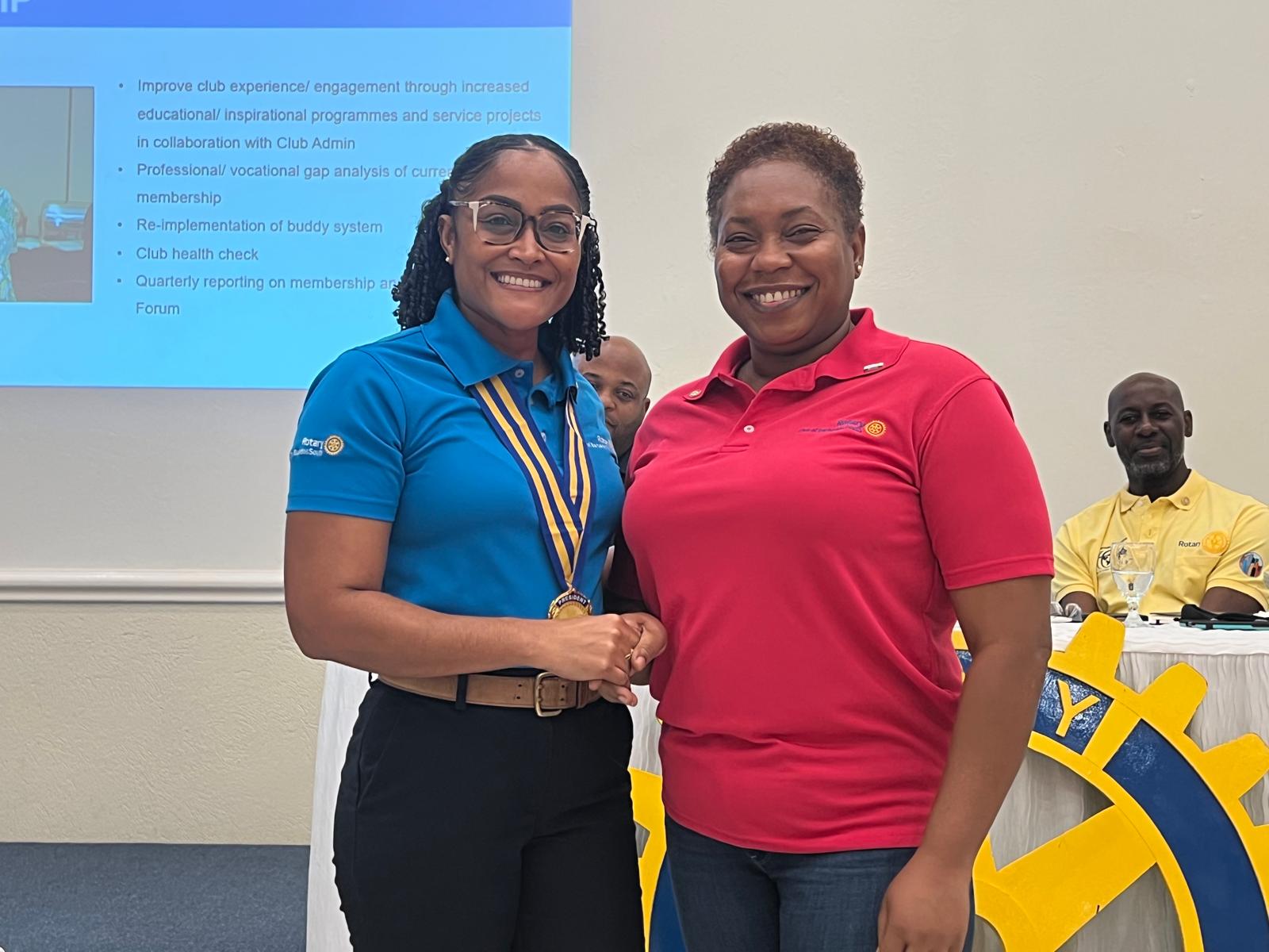 Dir Carrie-Ann with Pres Jackie after her pinning as director