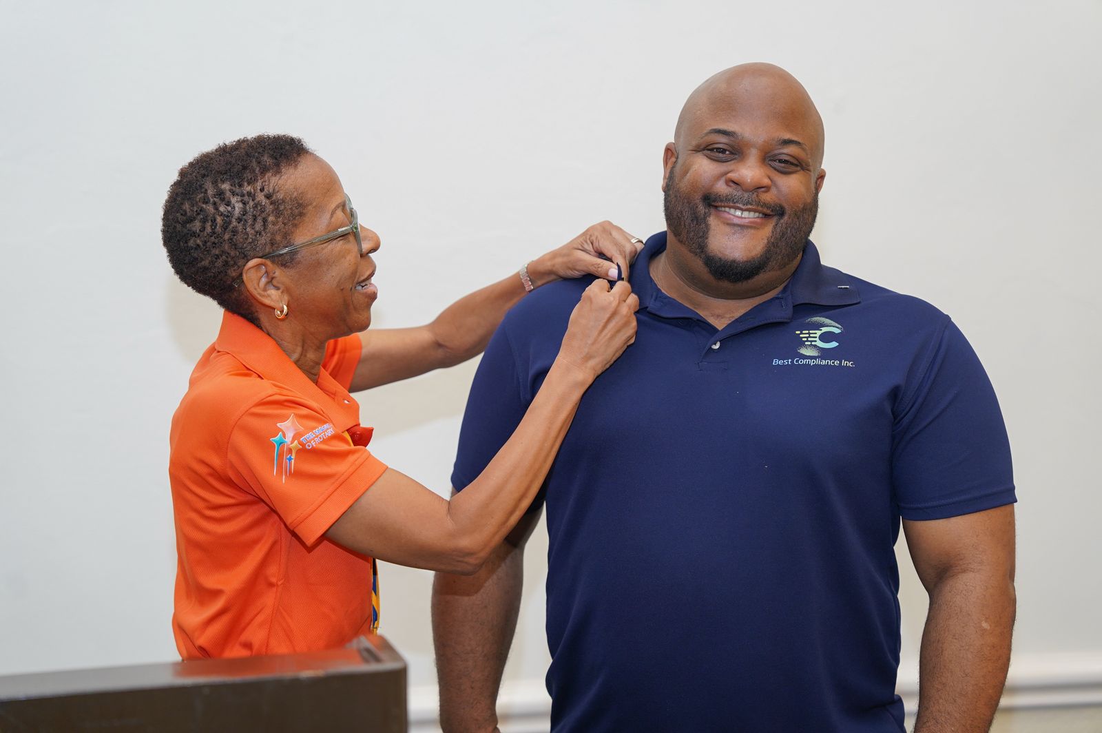 President Terry pinning Director Ryan