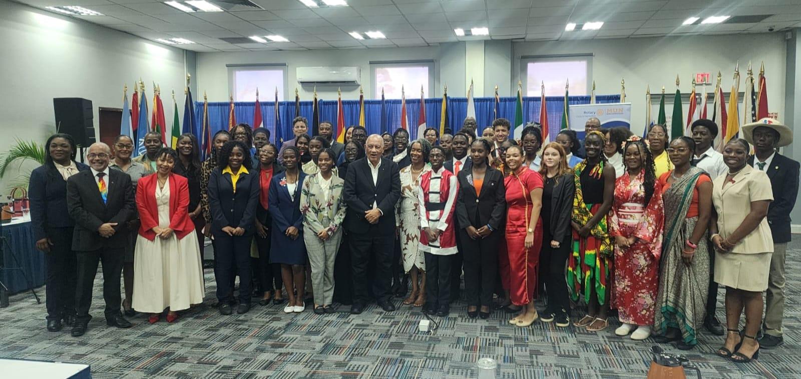 Full group of delegates, Rotarians and other volunteers