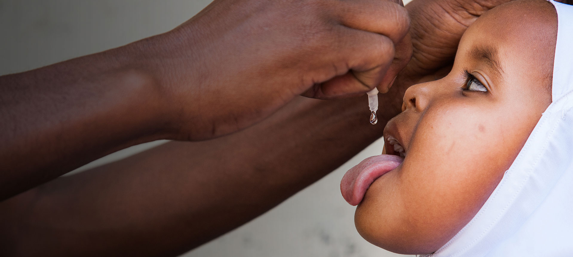 Image of baby receiving polio vaccine