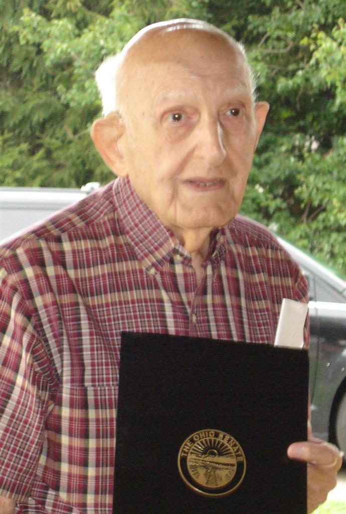 Paul Paris at his 90th Birthday Party receiving award.