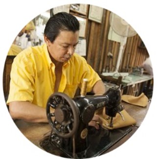 A person looking at the cameraDescription automatically generated