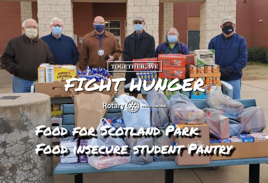 Wichita Falls North Rotary members deliver food for Scotland Park ES