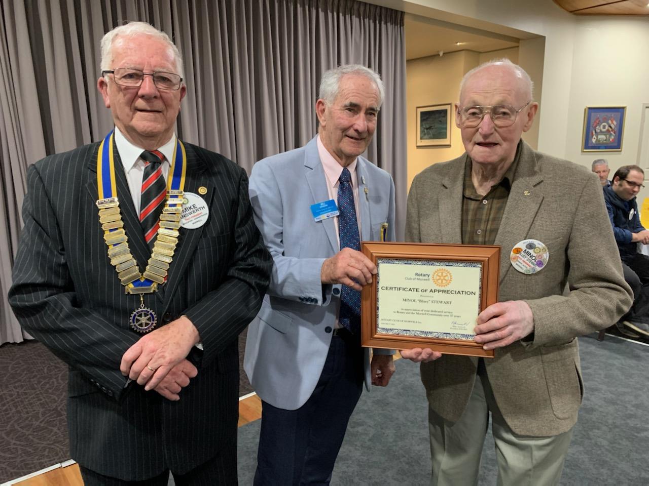 Bluey Stewart receiving his award for meritorious service