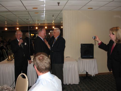 Gil Wishart Receiving Award from Frank Collins and Bob Wood