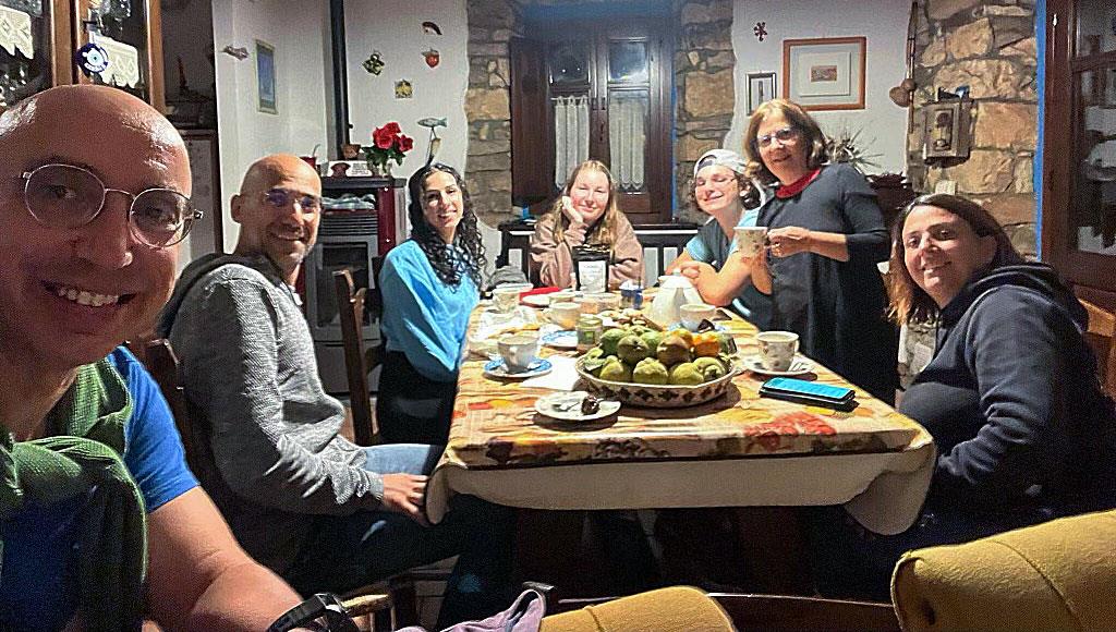 Soren Espe having tea with host family in Italy.