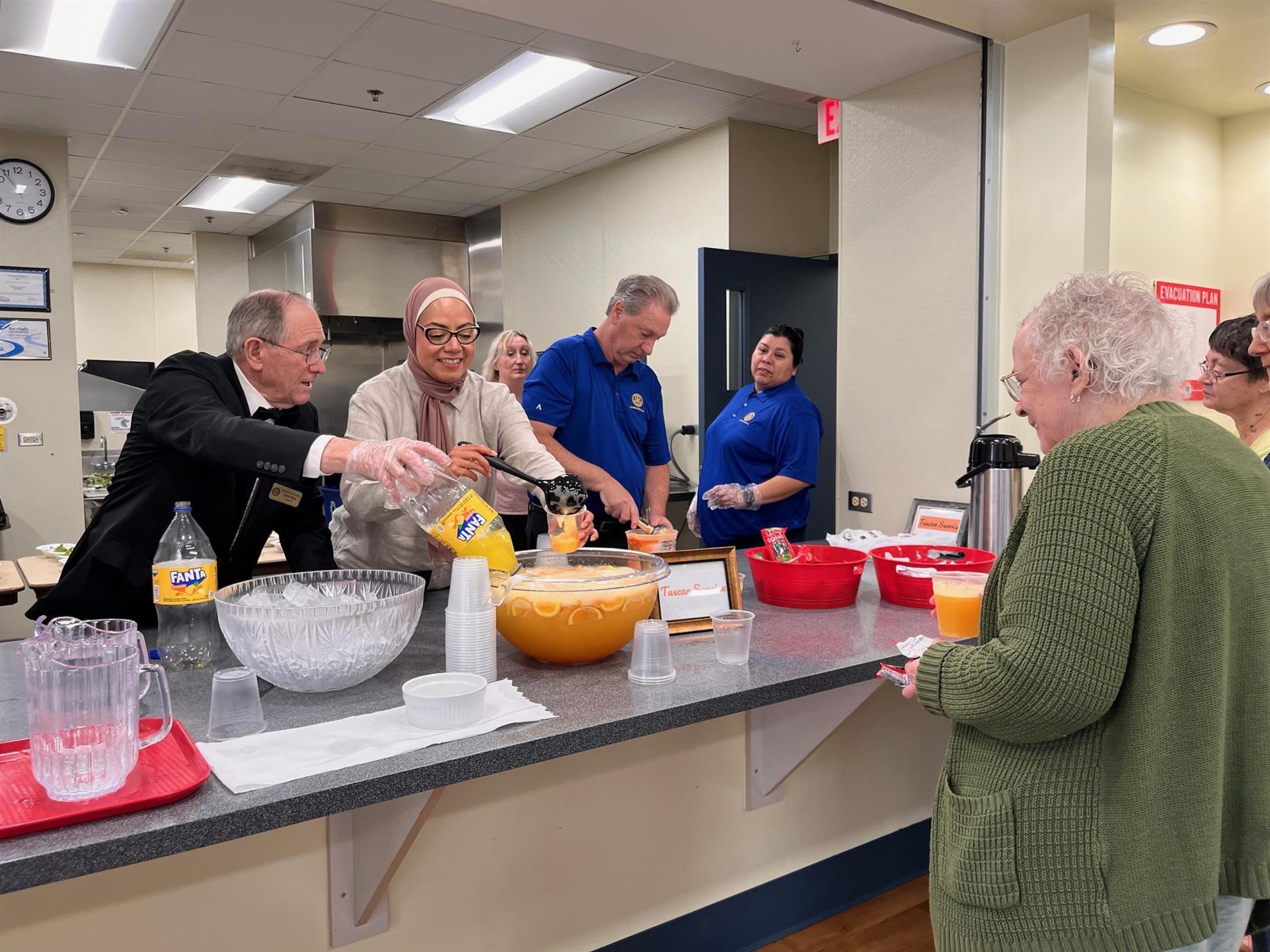 Rotary Club of Carpentersville members serving the community