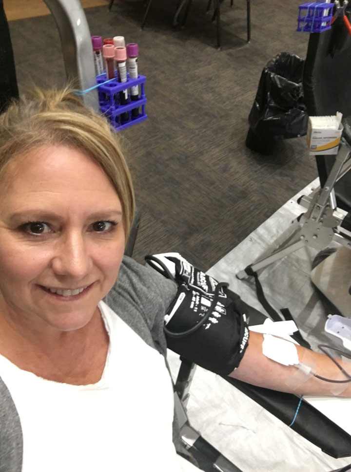 Diane smiles while donating Blood 4 Rotary.