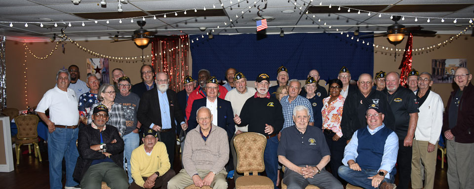 Military veterans in group photo.