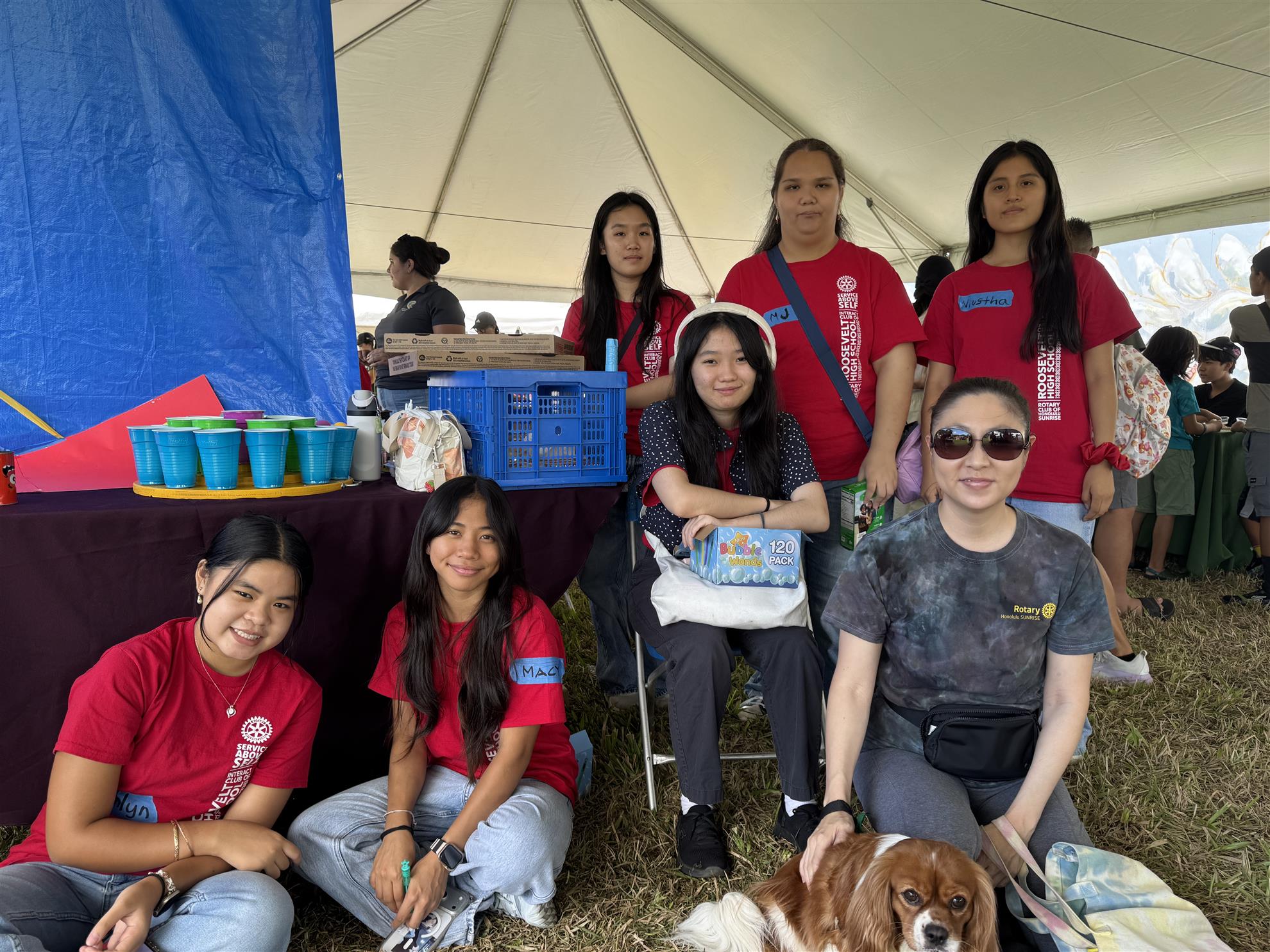 Volunteers gathered in the Rotary tent at Children and Youth Day