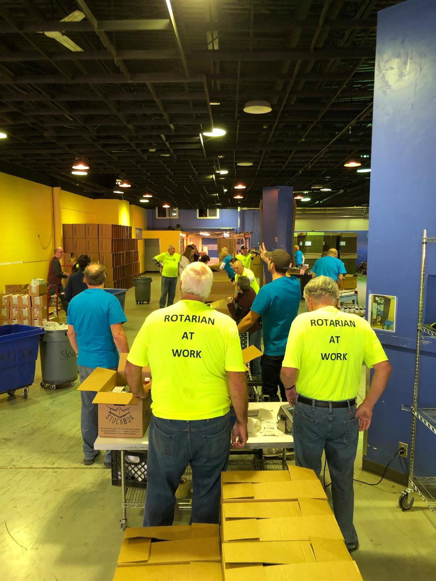 WPRC Members Packed Boxes for The Hunger Task Force StockBox Rotary