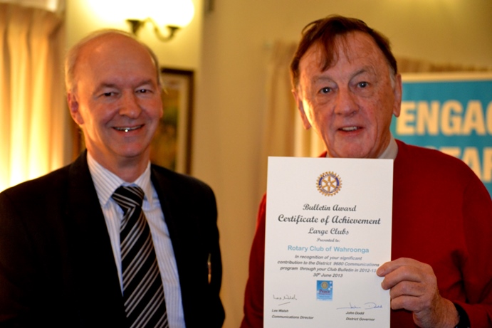 Our Editor of the Club's bulletin receiving a Certificate of Achievement 2013.