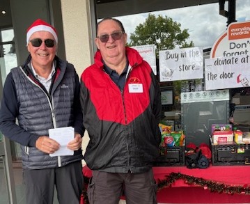 Two men standing outside a store

AI-generated content may be incorrect.