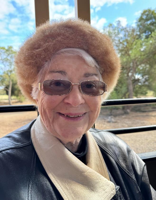 A person wearing sunglasses and a fur hatAI-generated content may be incorrect.