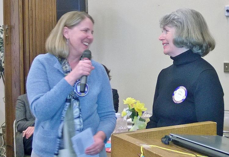 Judy Code receives the Northfield Rotary Club 2014 Good Neighbor Award from Erica Zweifel.