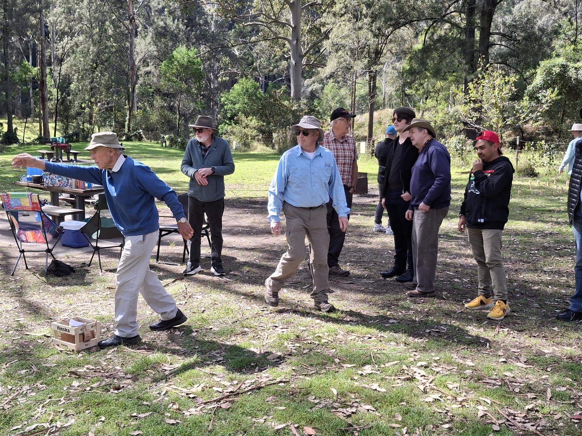 A game of Finska in progress among the group