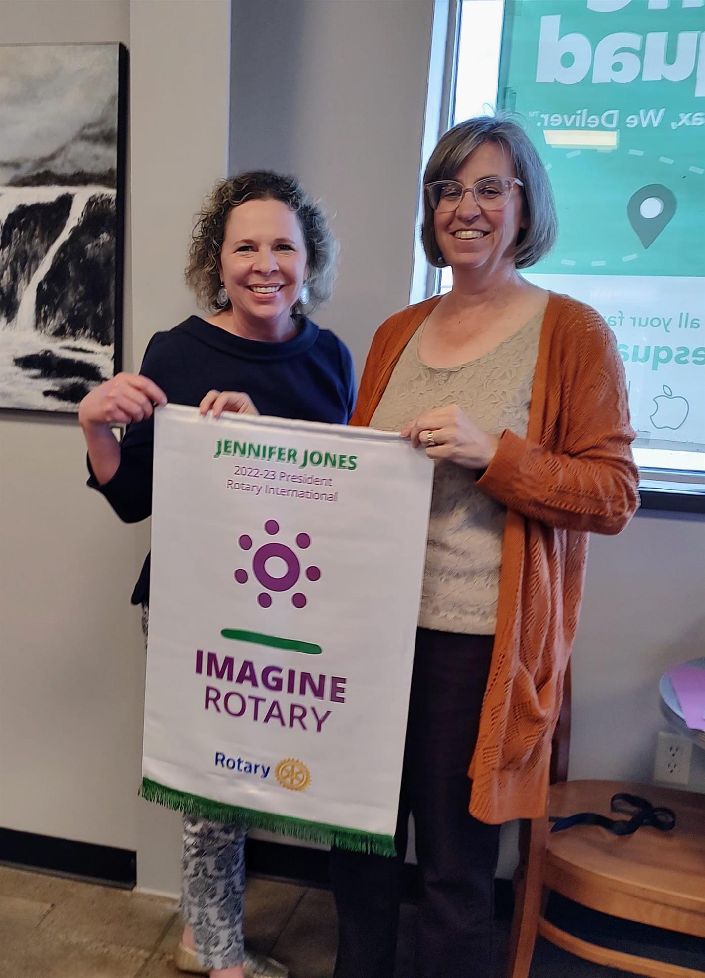 Club President receiving Rotary banner 2022