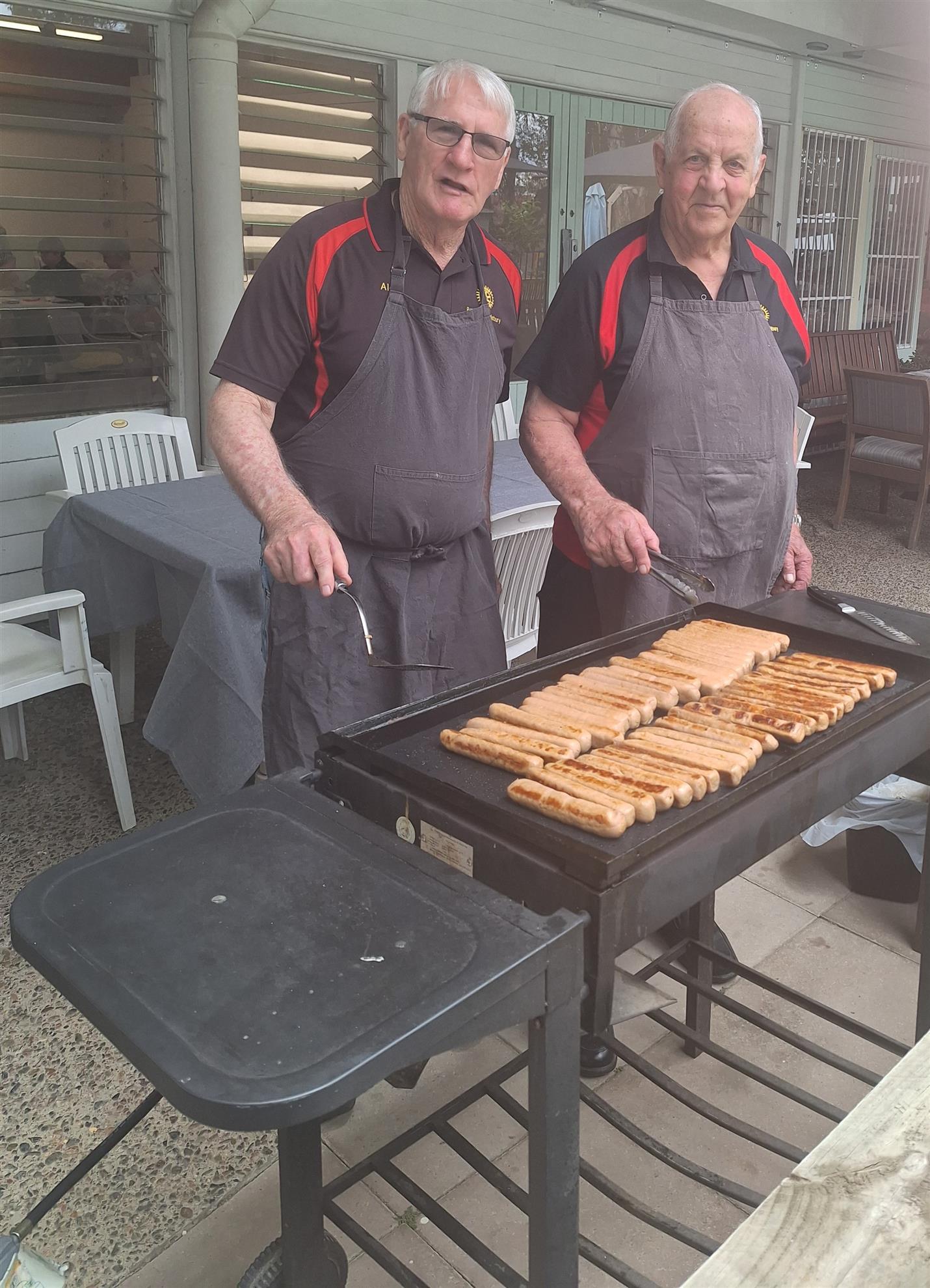 Members cooking for a Men's Group lunch