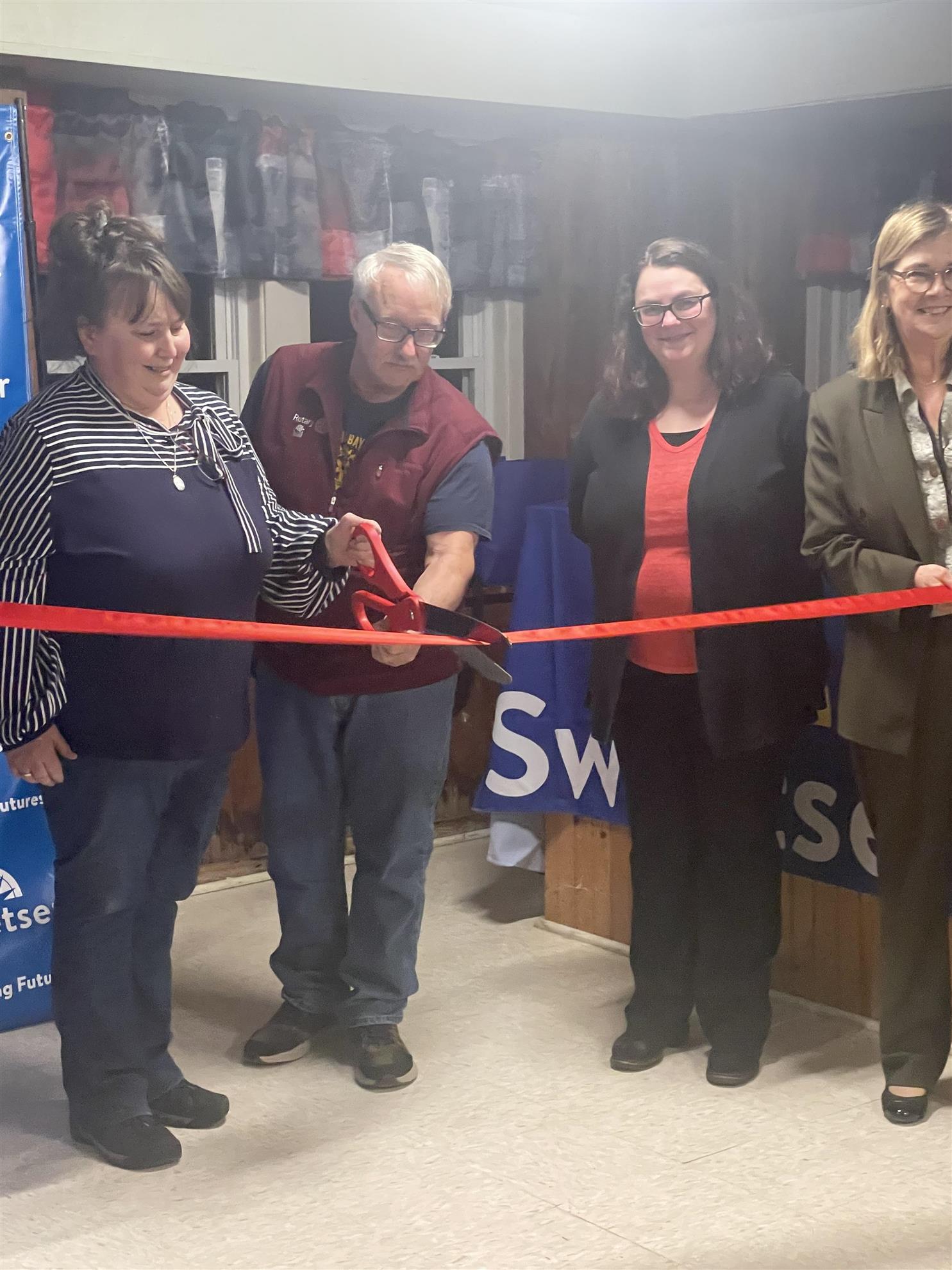 1--Ribbon-cutting-Sharri-and-Leo-and-Sweetser.jpeg