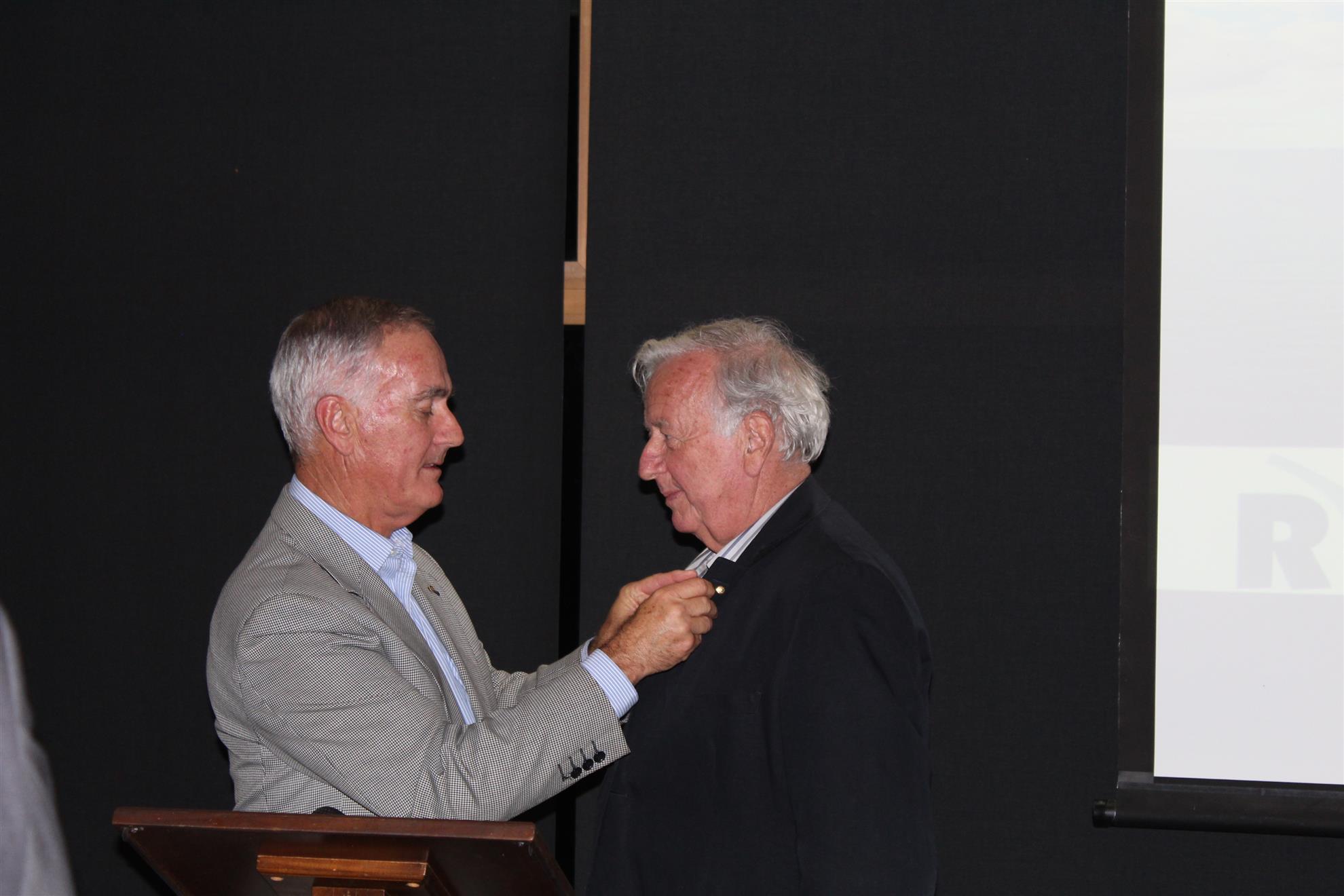 Richard Solomon receives his Paul Harris Fellowship Pin