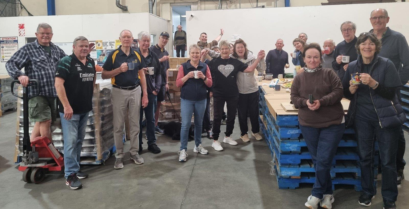 The Christmas pudding packing team enjoying morning tea
