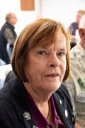 A person with short hair wearing a black jacketAI-generated content may be incorrect.