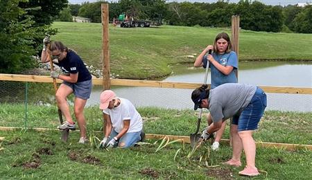 Rotarians Digging for Gold at the Little Elm Community Garden