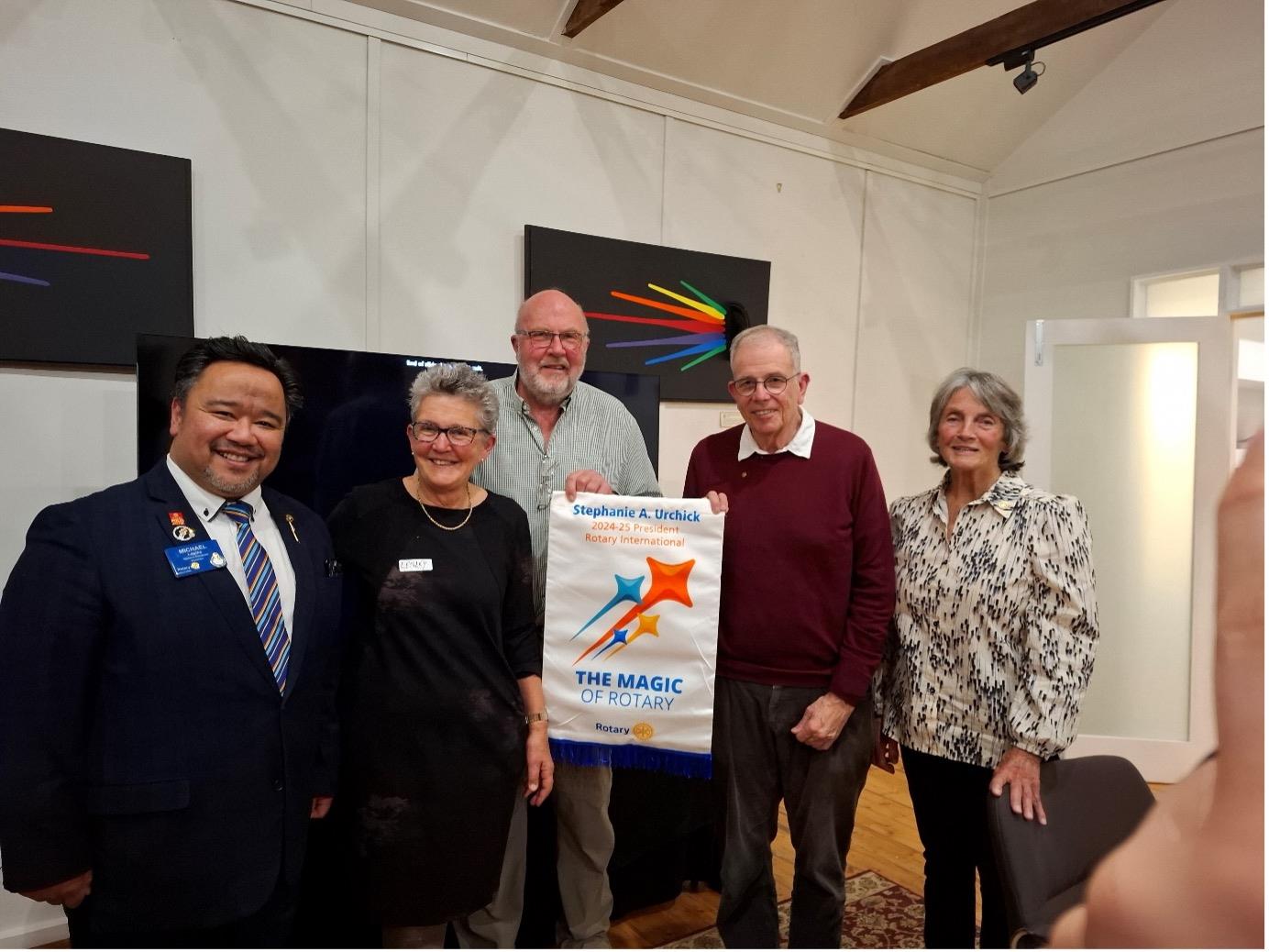 From right to left: Paul Harris Fellow Jenny Hopkins, newly inducted Rotarian Hal Swerissen, Mark Rak who has rejoined, Club President Lesley Hewitt and Rotary District Governor Michael Lapina