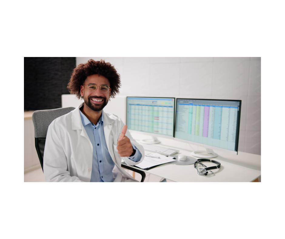 Healthcare professional smiling at their desk in a modern medical office