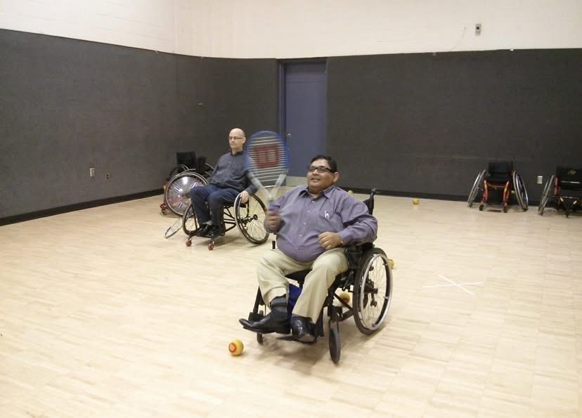 Playing wheelchair tennis