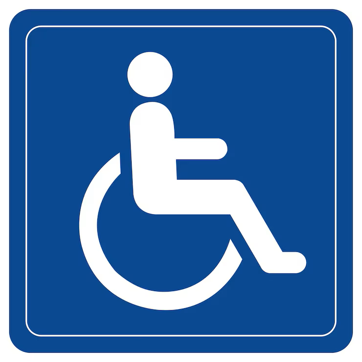 White wheelchair accessibility symbol on a blue background representing mobility, accessibility, and disability inclusion.