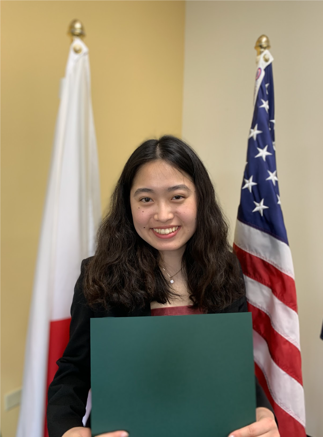 A person smiling at cameraAI-generated content may be incorrect.