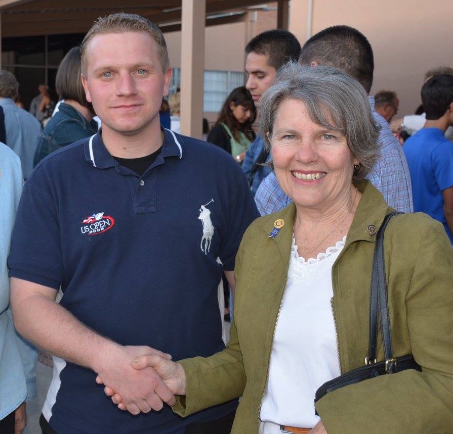 Alison Pannell, President of the Rotary Club of Los Alamos, congratulates Nate Lawson upon graduating with his High School Equivalency (HSE) diploma May 12th.  Lawson, who was a graduation speaker and hopes to attend UNM, was one of 19 UNM-LA HSE graduates who used Rotary Club vouchers to pay for his exam fees.