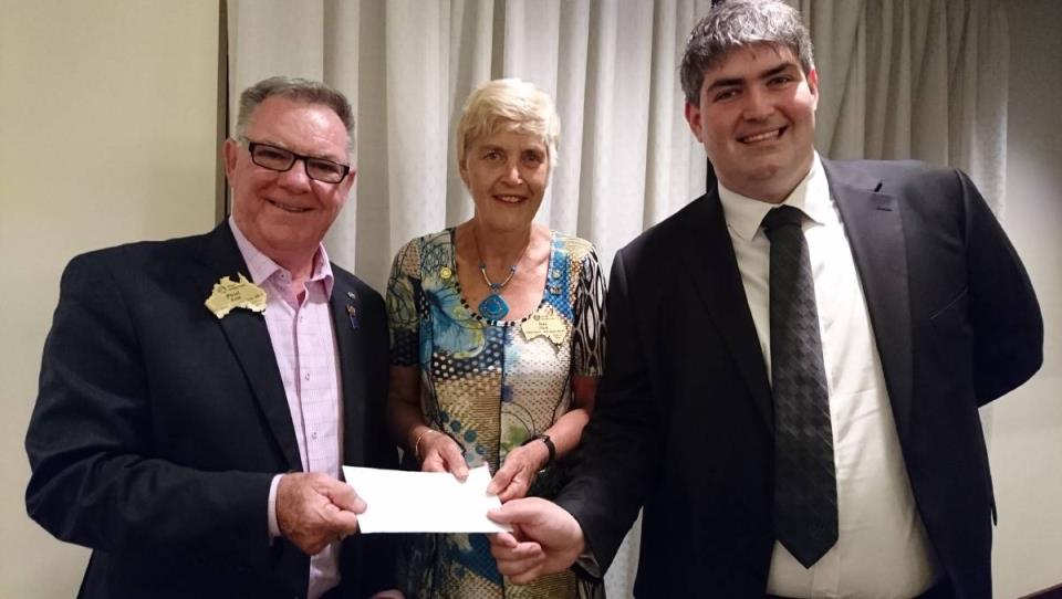 Polio battle: District Rotary Foundation chair Paul Reid receives cheques for more than $8200 from Assistant Governor Northern Illawarra Rotary Clubs Sue Clark and former president of UOW Rotoract Club Zac Fitzpatrick.