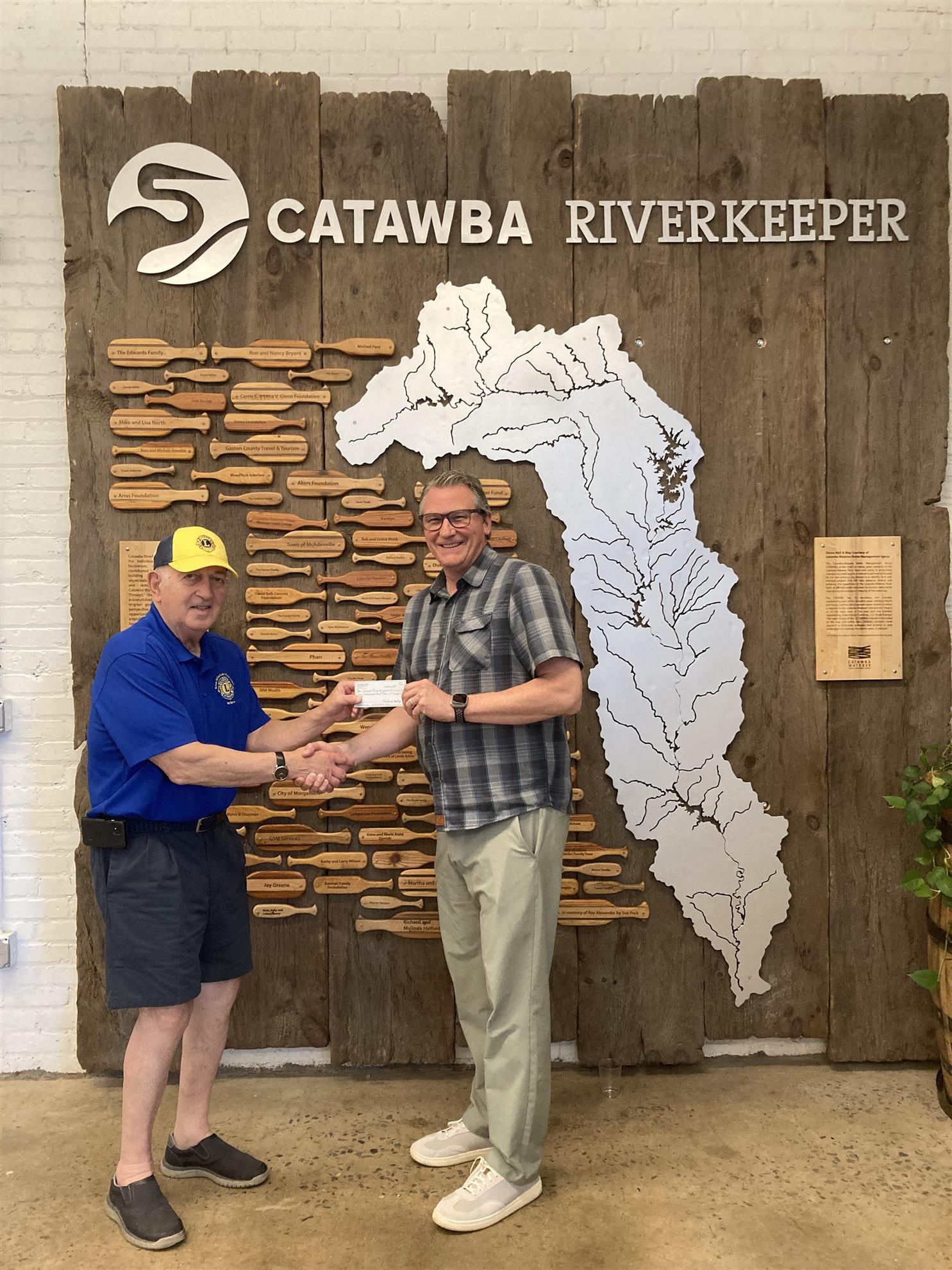 Don Nowak presenting check to Catawba Riverkeeper John Searby