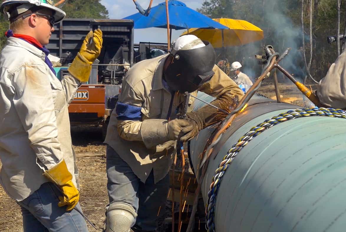 Pipeline worker operating on pipeline