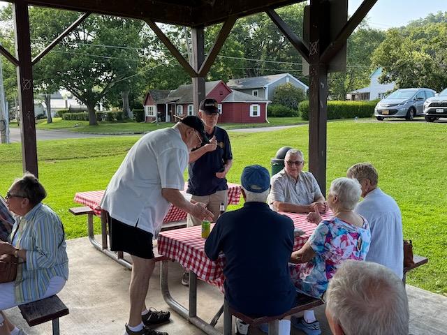 A group of people sitting around a table