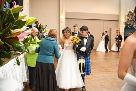 May be an image of 10 people and wedding