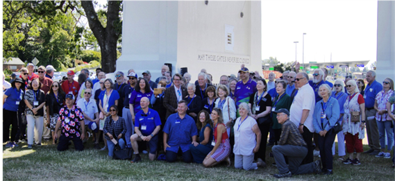 Title: Rotarians gathered beneath the Peace Arch during Rotary Hands Across the Border. - Description: Rotarians gathered beneath the Peace Arch during Rotary Hands Across the Border.